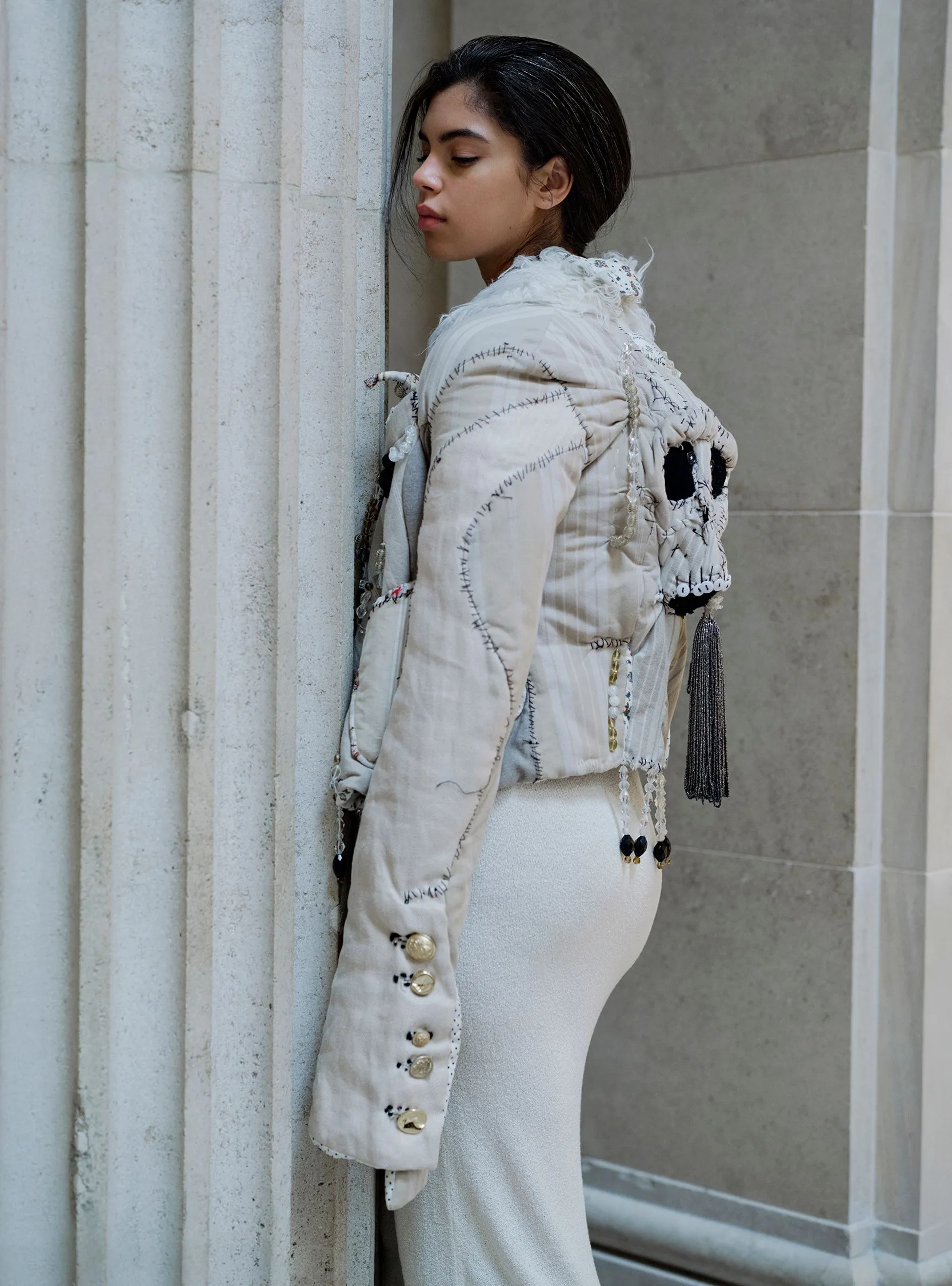 Image may contain Aaron McKie Clothing Sleeve Long Sleeve Blouse Coat Jacket Pants Adult Person and Cape