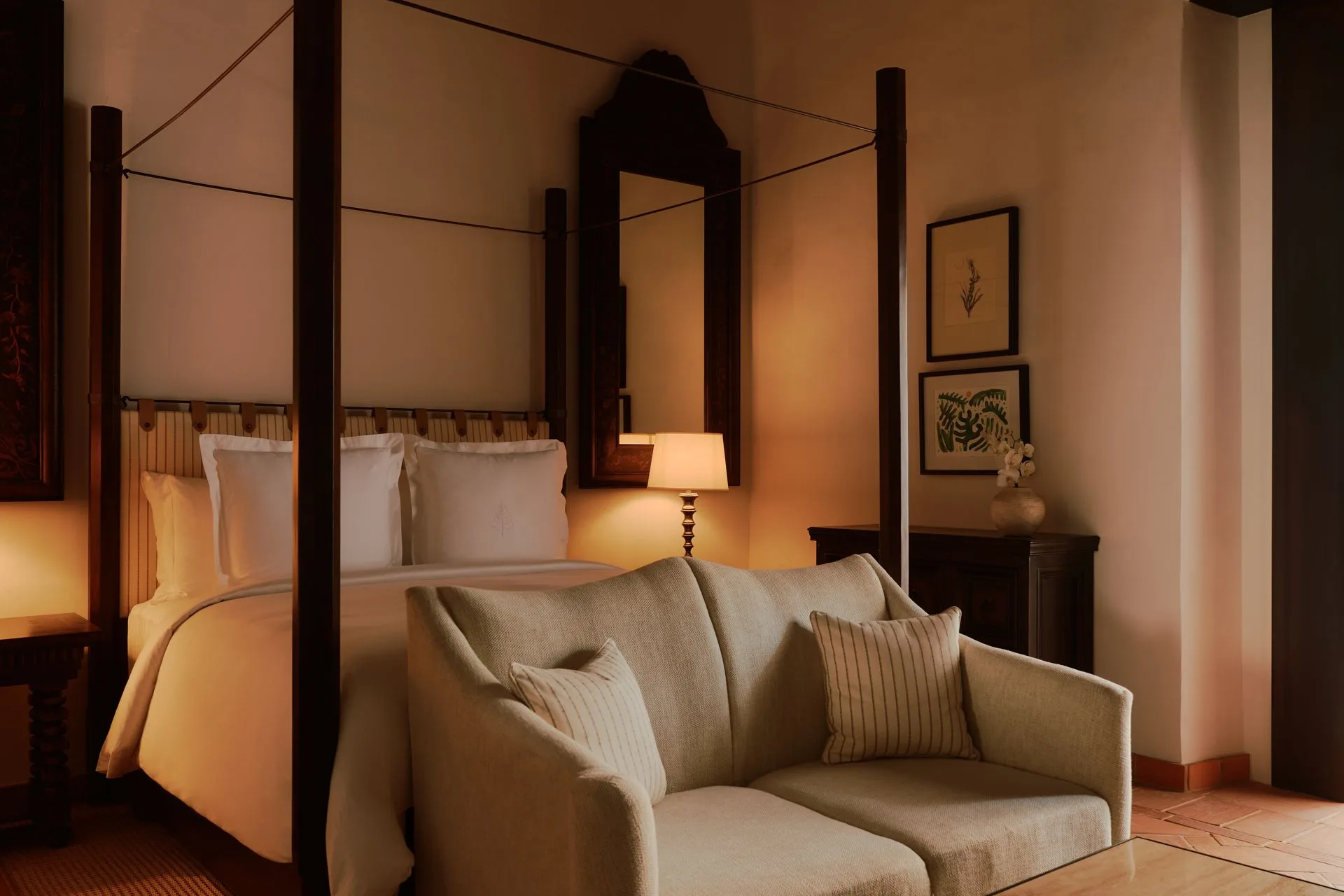 Image may contain Lamp Couch Furniture Cushion Home Decor Architecture Building Indoors Living Room and Room