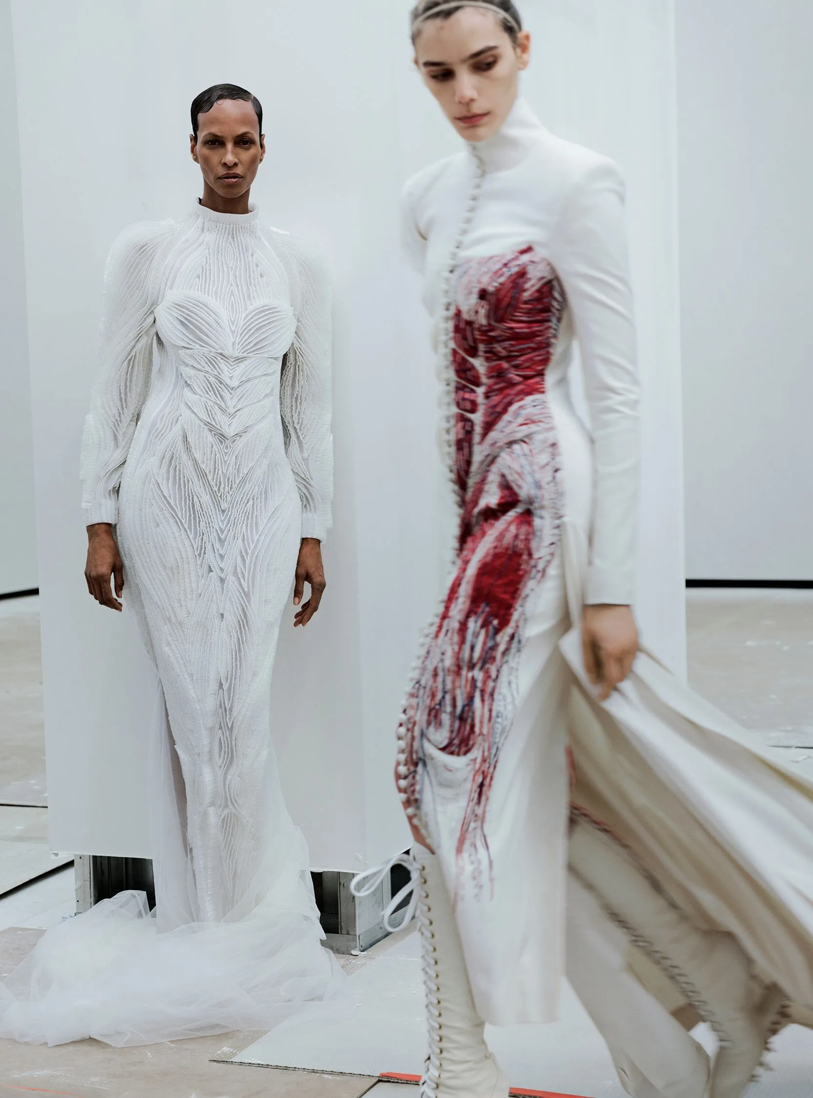 Image may contain Ysica Toscanini Yasmin Warsame Clothing Long Sleeve Sleeve Dress Fashion Formal Wear and Gown