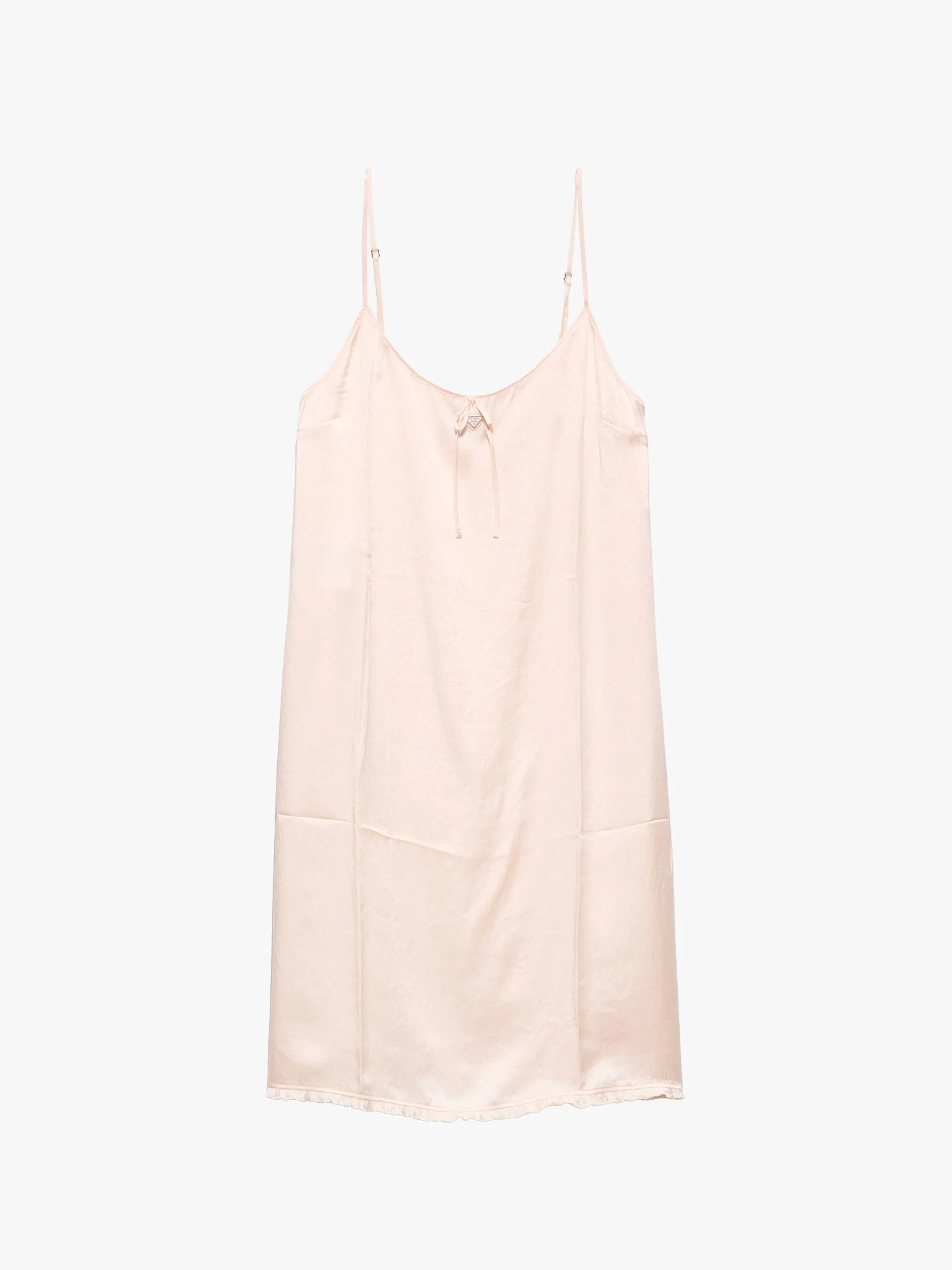 Image may contain: Blouse, Clothing, Home Decor, Linen, Tank Top, and Skirt