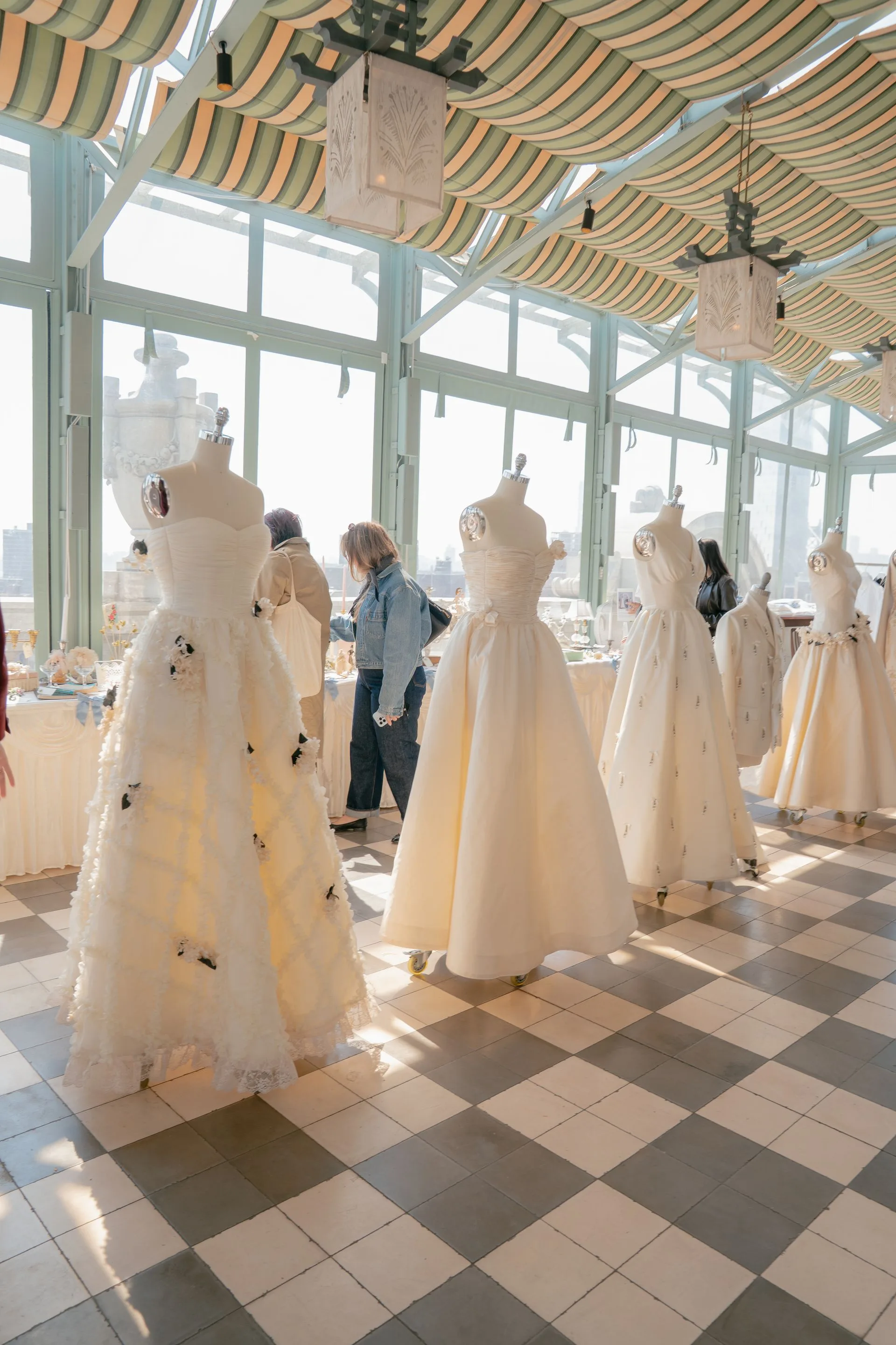 Image may contain Clothing Dress Adult Person Formal Wear Fashion Gown Wedding and Wedding Gown